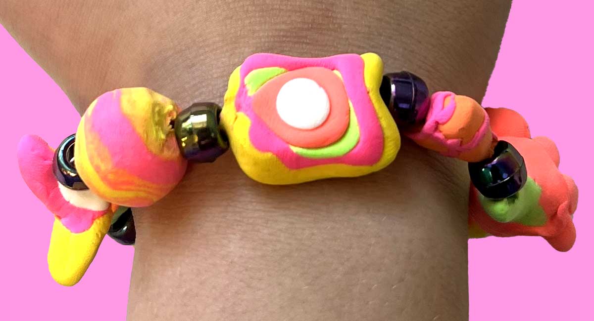 Image of a colorful handmade bracelet on a wrist
